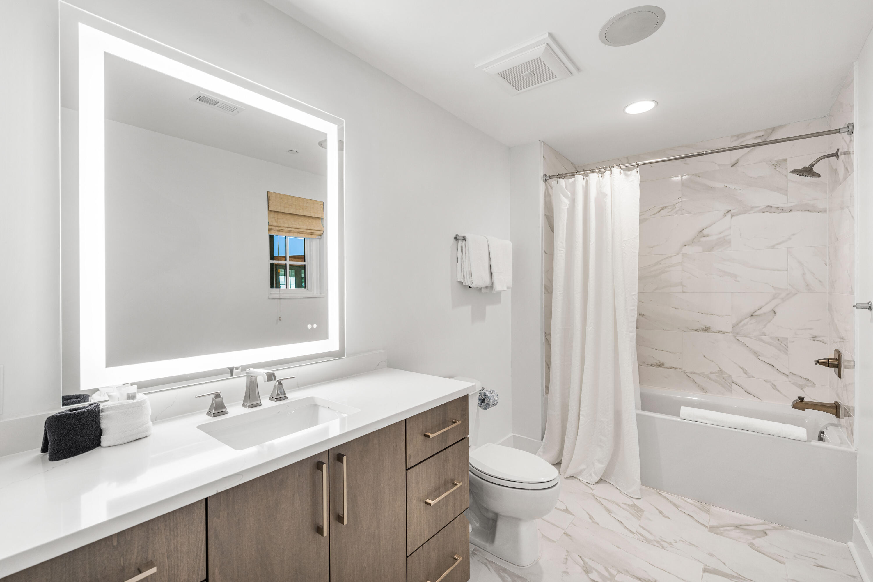 136 Georgetown Avenue, Unit 2D1 Inlet Beach, FL 32461 - Photo 32 of 80 a bathroom with a sink a toilet and shower