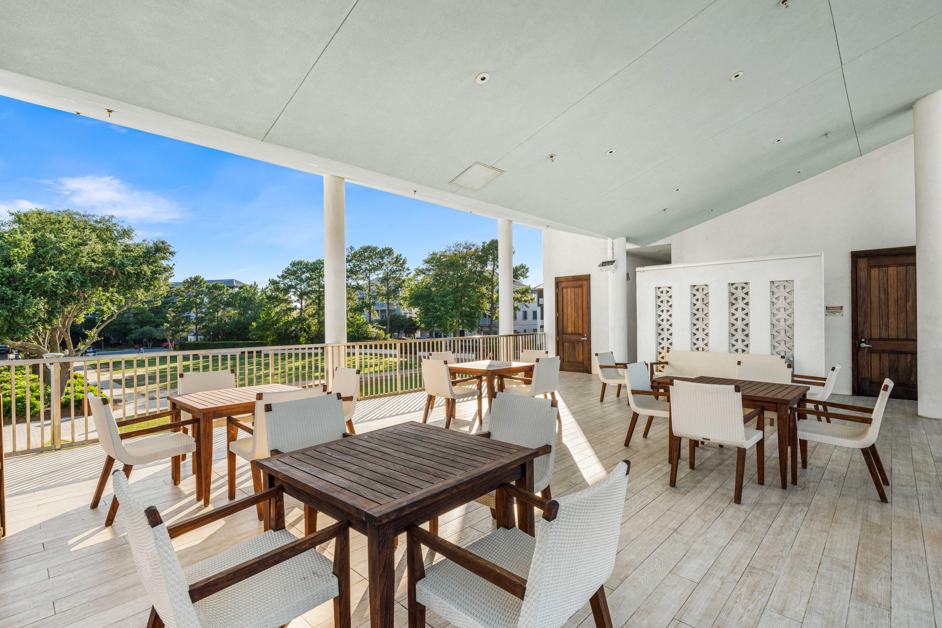 136 Georgetown Avenue, Unit 2D1 Inlet Beach, FL 32461 - Photo 62 of 80 a dining room with furniture and wooden floor