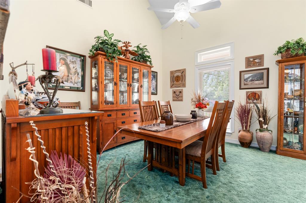 1264 Overlook Drive Whitney, TX 76692 - Photo 12 of 39 a view of a dining room with furniture and chandelier