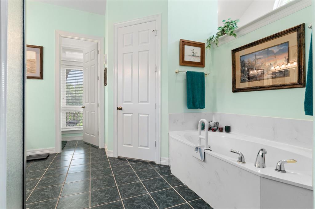 1264 Overlook Drive Whitney, TX 76692 - Photo 19 of 39 a bathroom with a sink and a mirror