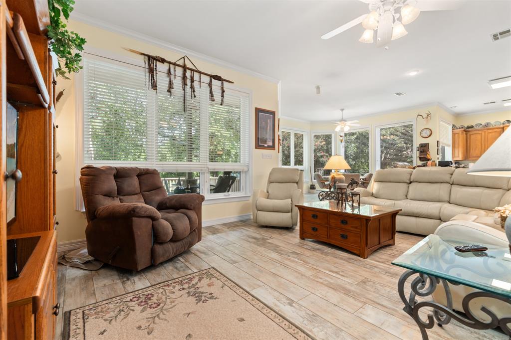 1264 Overlook Drive Whitney, TX 76692 - Photo 23 of 39 a living room with furniture and a large window