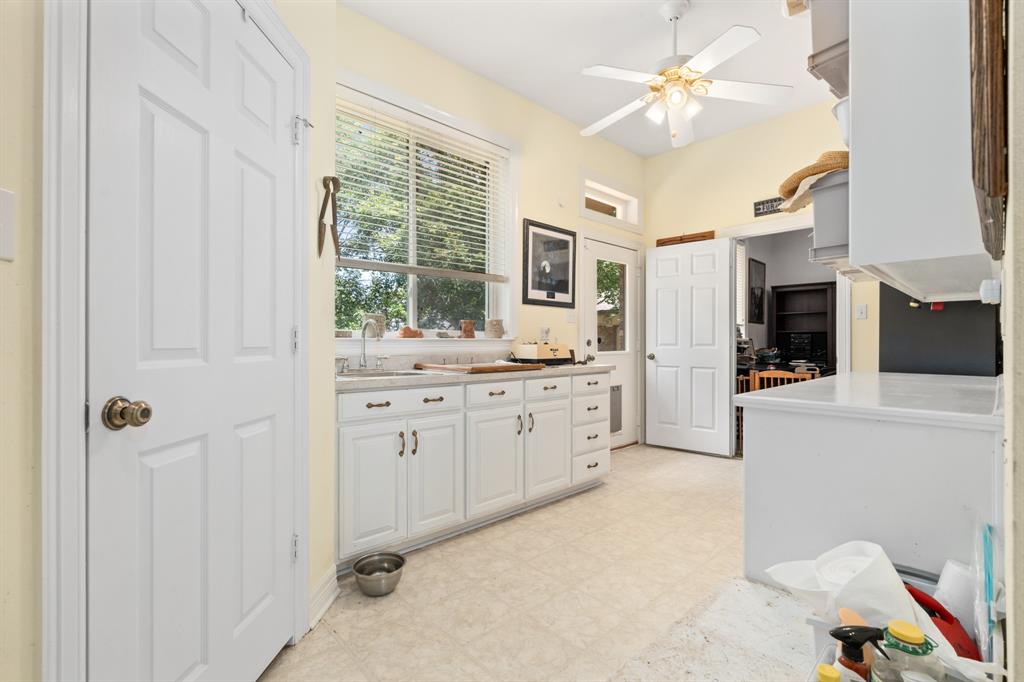 1264 Overlook Drive Whitney, TX 76692 - Photo 30 of 39 a bathroom with a sink a vanity and a mirror