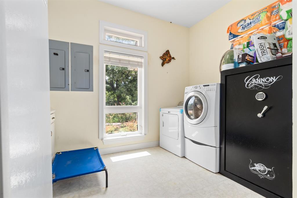 1264 Overlook Drive Whitney, TX 76692 - Photo 33 of 39 a view of utility room with washer and dryer