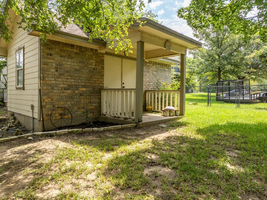 1264 Overlook Drive Whitney, TX 76692 - Photo 38 of 39 a view of a backyard with a garden