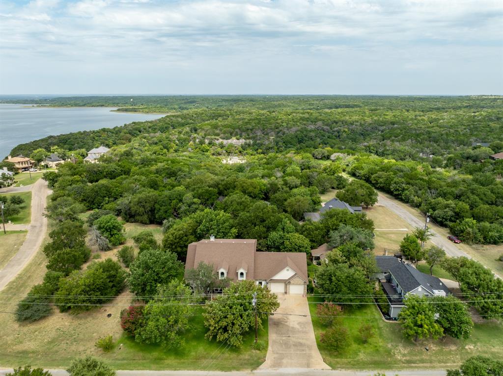 1264 Overlook Drive Whitney, TX 76692 - Photo 5 of 39 an aerial view of a house with a garden