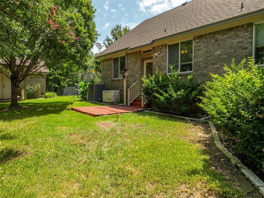 1264 Overlook Drive Whitney, TX 76692 - Photo 8 of 39 a view of a house with backyard and garden