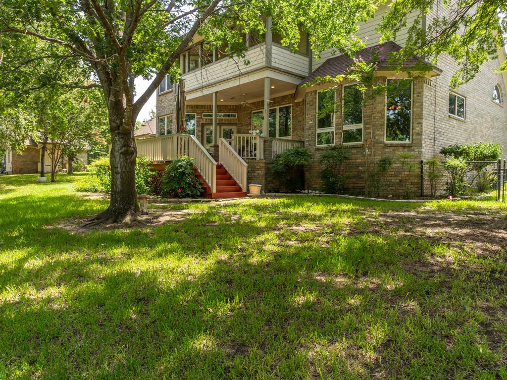 1264 Overlook Drive Whitney, TX 76692 - Photo 9 of 39 front view of a house with a yard