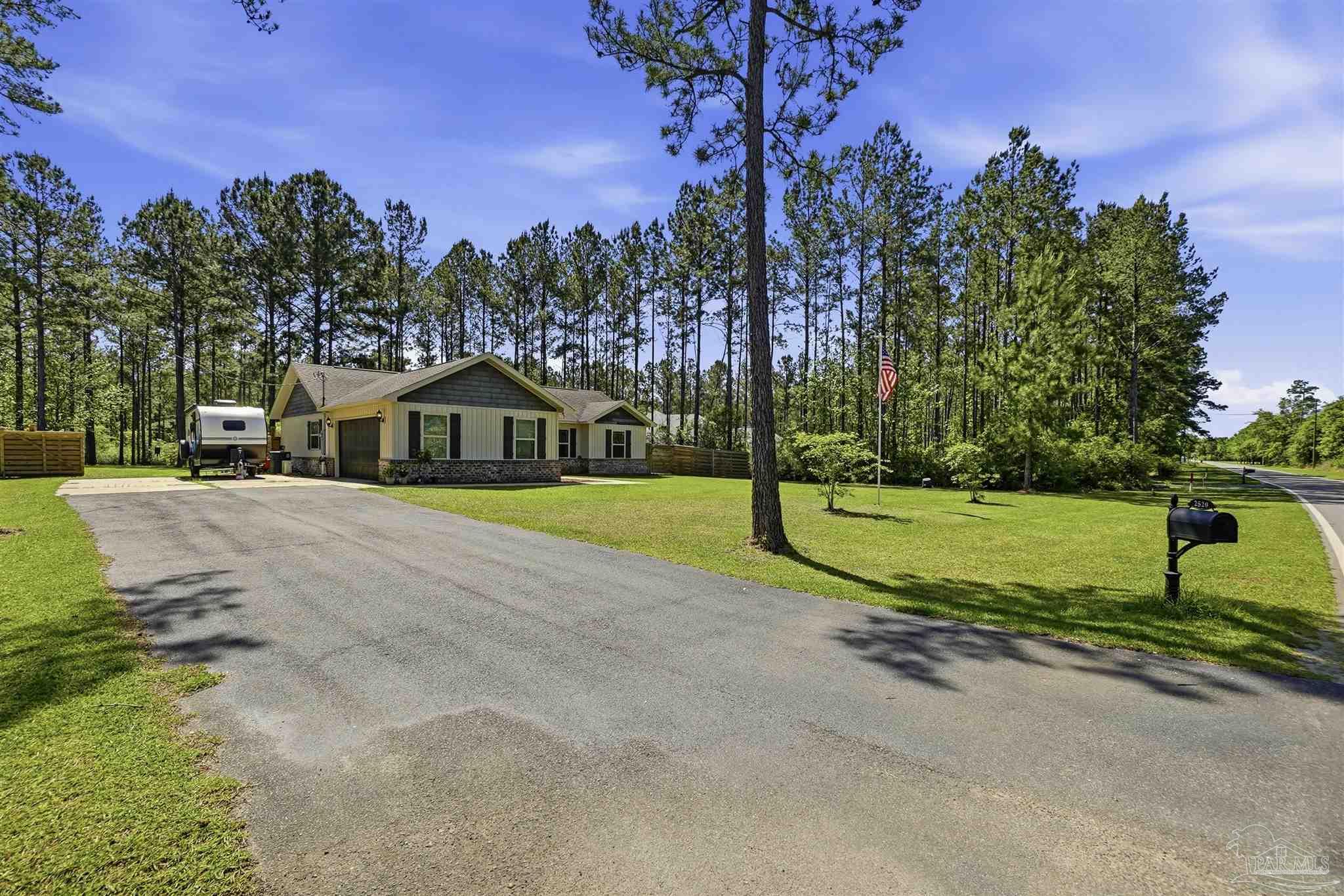 2520 10 Mile Road Pace, FL 32571 - Photo 3 of 40 Spacious driveway with ample parking