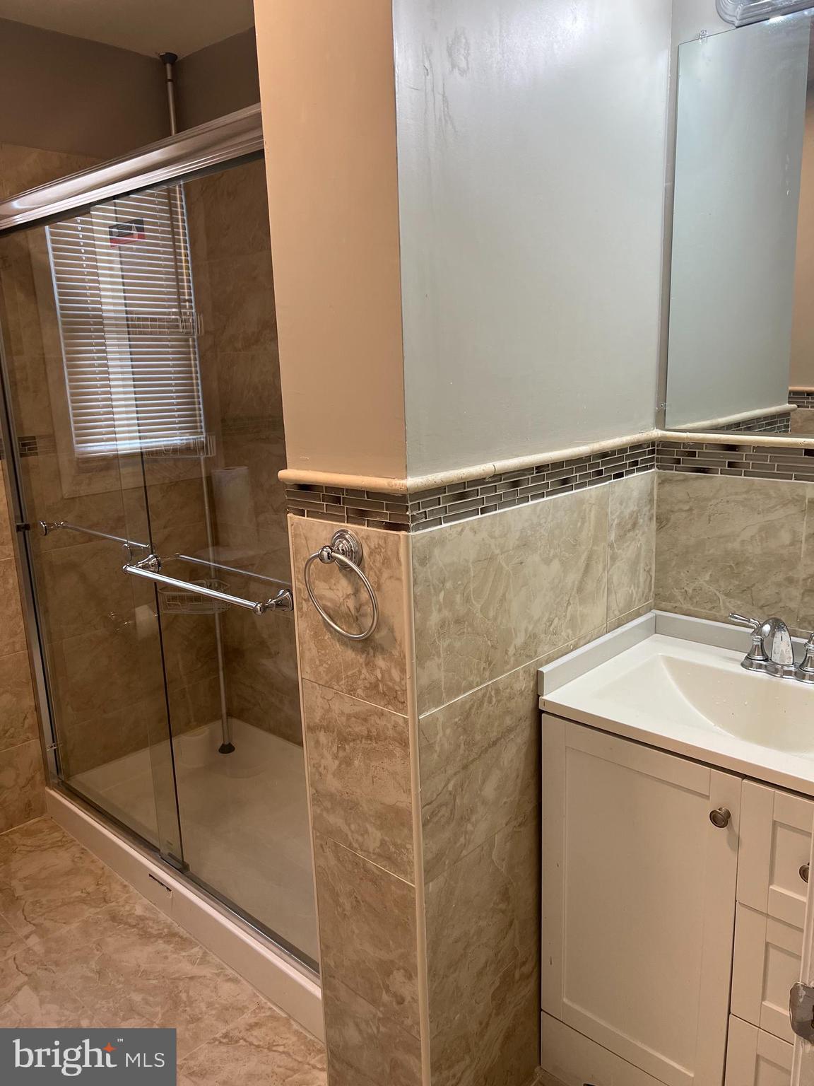 229 Chews Landing Road Lindenwold, NJ 08021 - Photo 10 of 11 a bathroom with a sink and mirror
