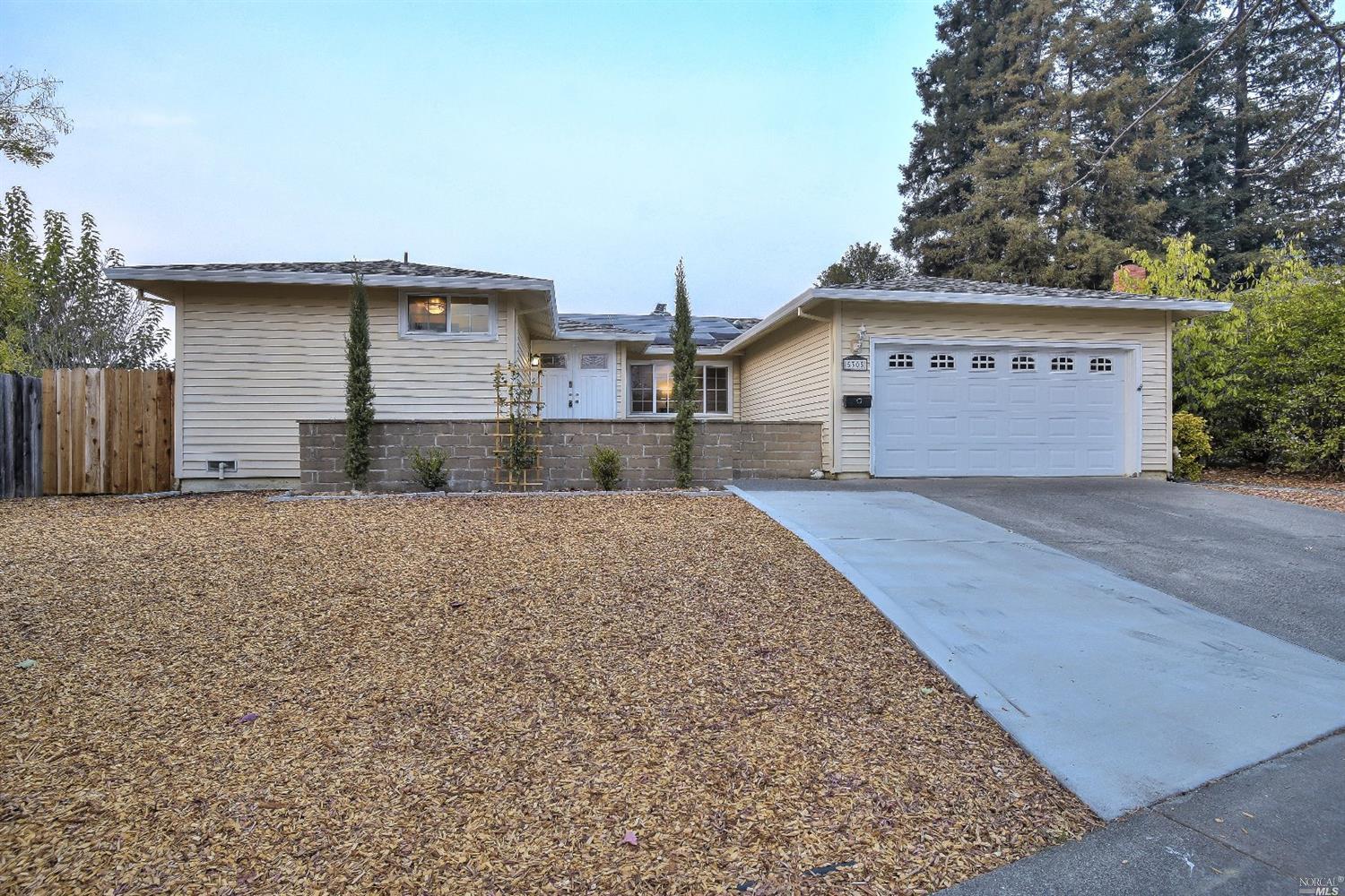 5305 Yerba Buena Road Santa Rosa, CA 95409 - Photo 1 of 1 a front view of a house with a yard