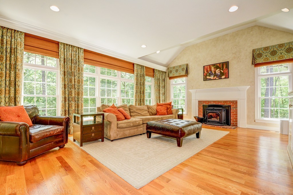 29 Prospect Street Upton, MA 01568 - Photo 12 of 30 a living room with furniture and a fireplace