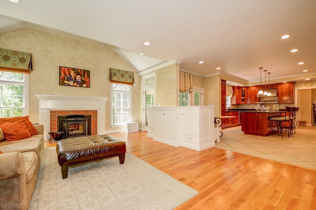 29 Prospect Street Upton, MA 01568 - Photo 13 of 30 a living room with furniture and a fireplace