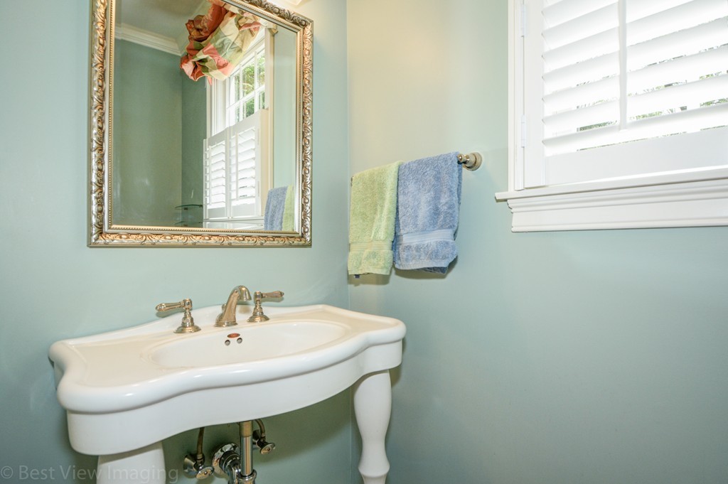 29 Prospect Street Upton, MA 01568 - Photo 16 of 30 a white sink sitting next to a bathroom sink