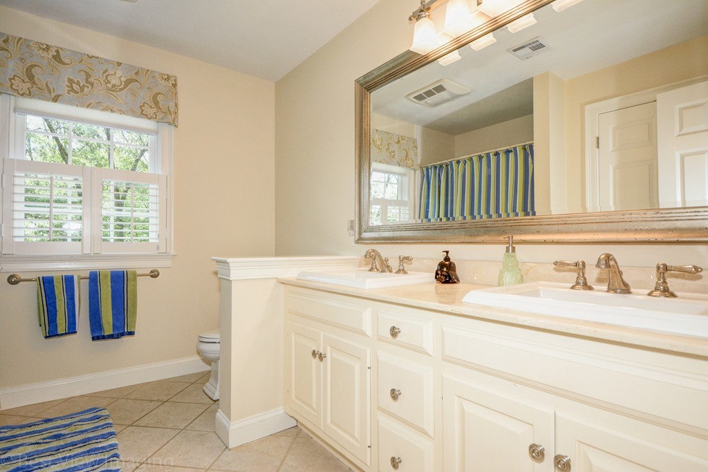 29 Prospect Street Upton, MA 01568 - Photo 23 of 30 a bathroom with a sink and a mirror