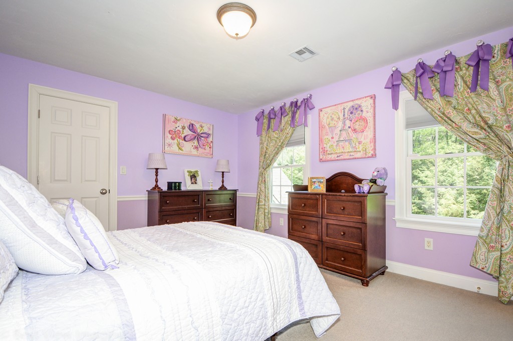 29 Prospect Street Upton, MA 01568 - Photo 25 of 30 a bedroom with a bed and a dresser