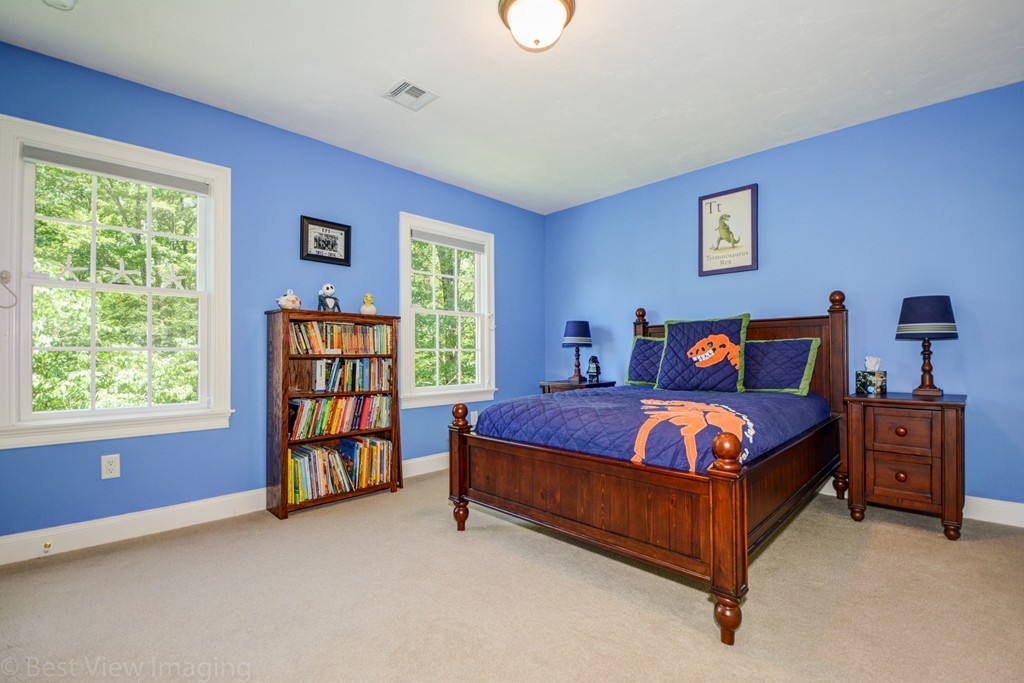 29 Prospect Street Upton, MA 01568 - Photo 26 of 30 a bedroom with a bed and windows