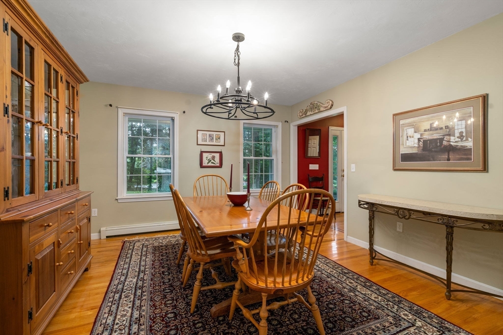 60 Easter Brook Road Lunenburg, MA 01462 - Photo 11 of 37 a view of a dining room with furniture window and wooden floor