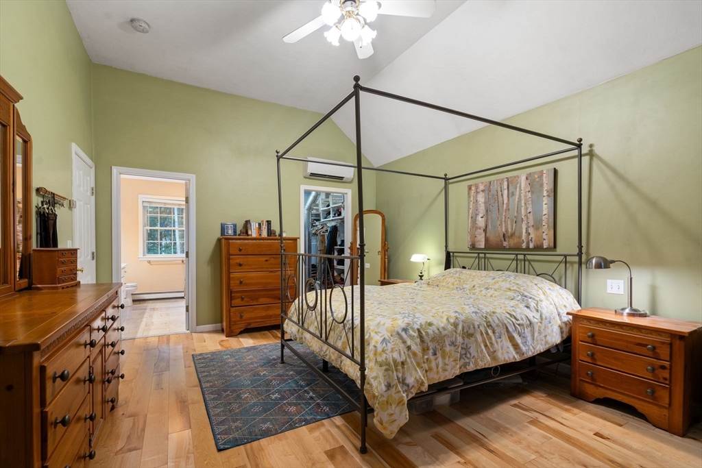 60 Easter Brook Road Lunenburg, MA 01462 - Photo 18 of 37 a bedroom with a bed and wooden floor
