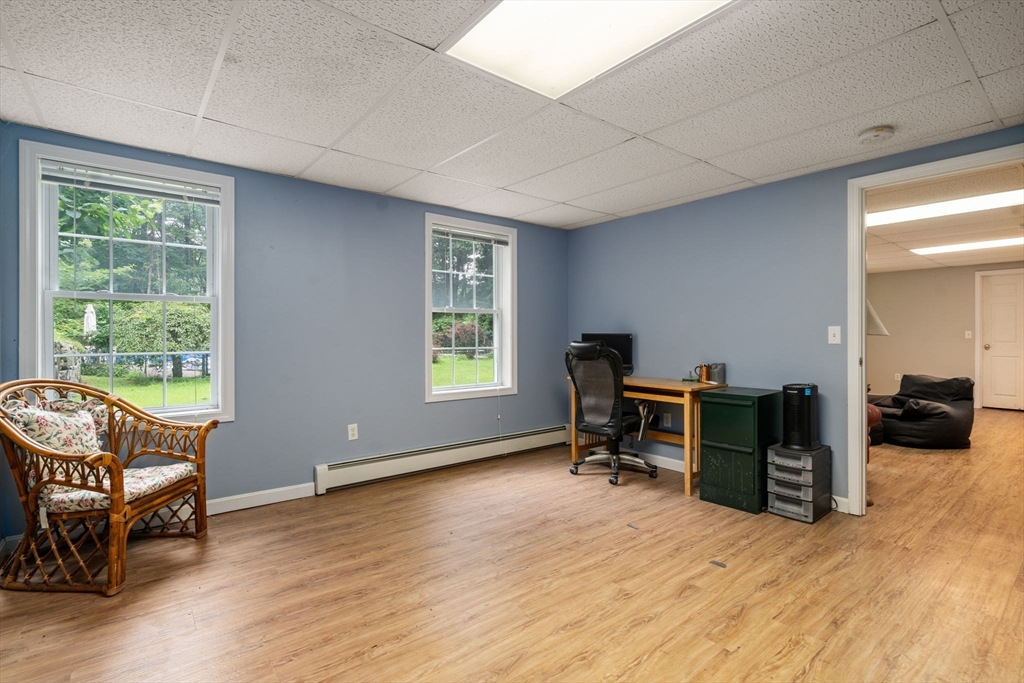 60 Easter Brook Road Lunenburg, MA 01462 - Photo 24 of 37 a view of a livingroom with furniture and a window