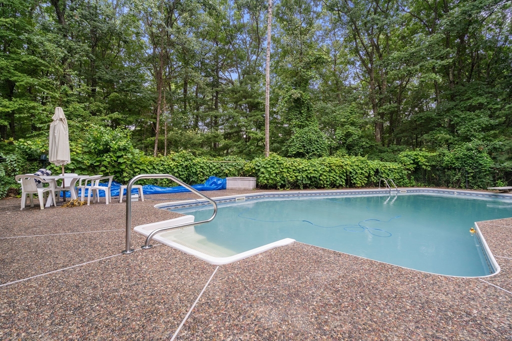 60 Easter Brook Road Lunenburg, MA 01462 - Photo 30 of 37 a view of a swimming pool with a yard