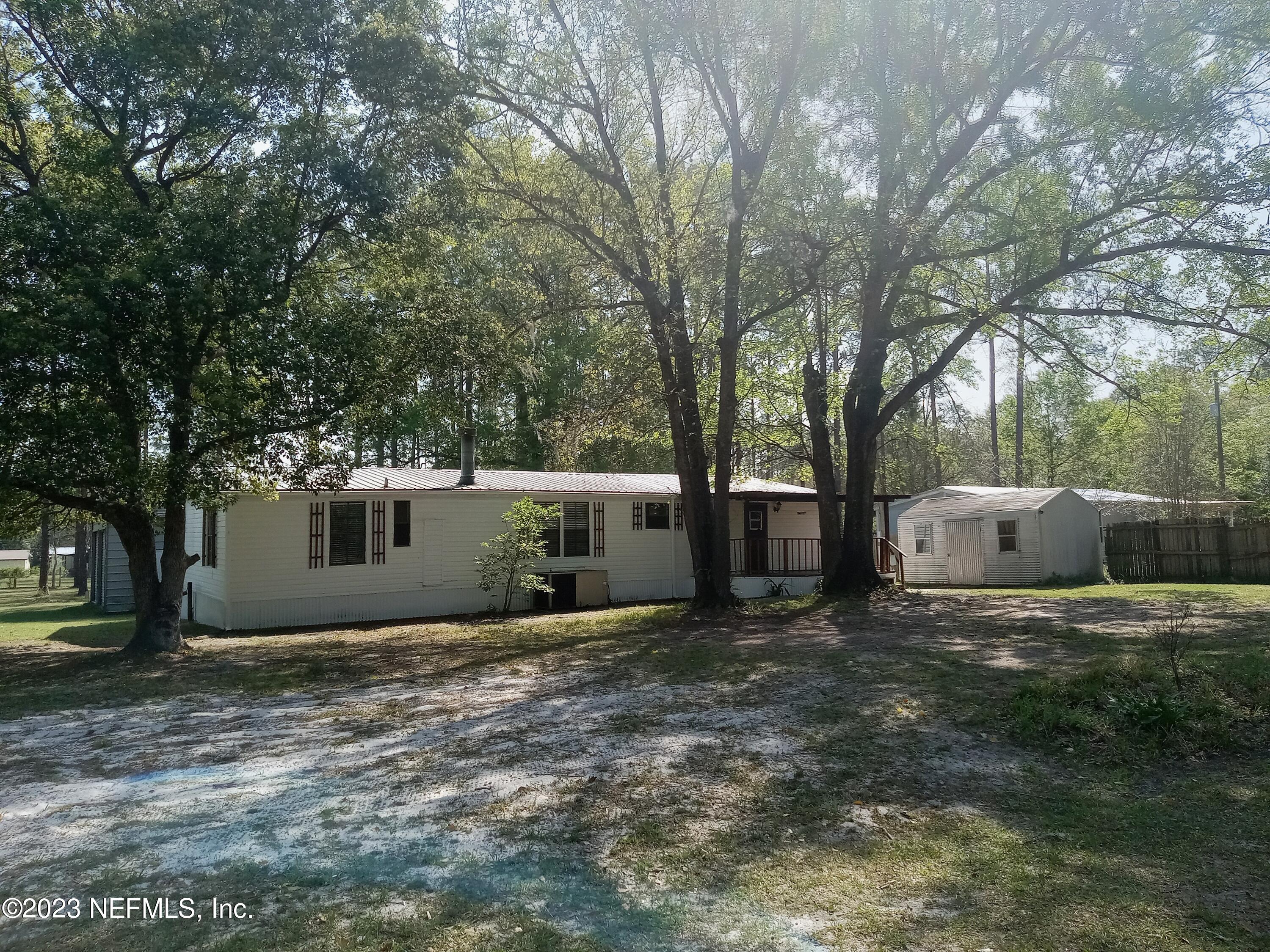 2306 Tyrone Road Middleburg, FL 32068 - Photo 3 of 17 Back of Home wnd Workshop