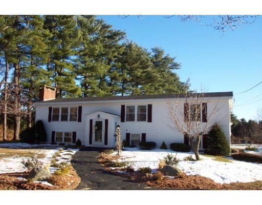 76 Bellevue Road Andover, MA 01810 - Photo 1 of 4 a front view of a house with a yard covered with snow