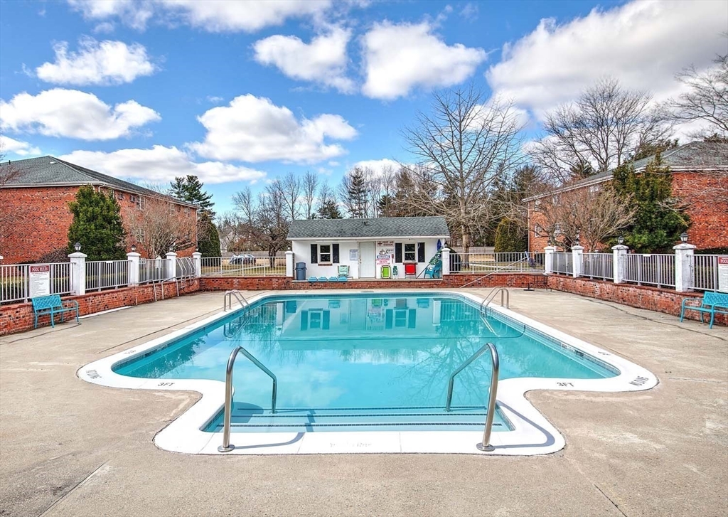 91 Pleasant Street, Unit A6 Medfield, MA 02052 - Photo 24 of 29 a view of outdoor space swimming pool and outdoor seating