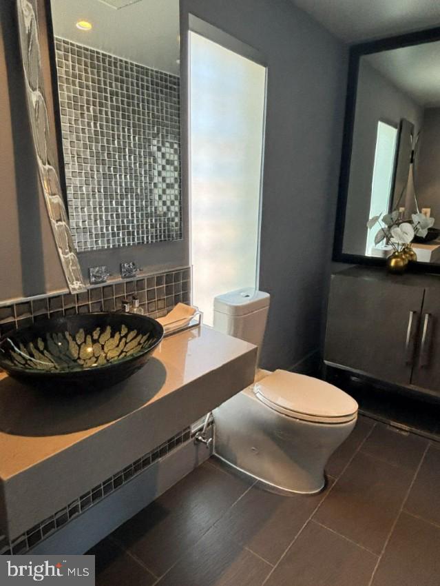 2424 18th Street Northwest, Unit R4 Washington, DC 20009 - Photo 15 of 40 a bathroom with a sink and a mirror