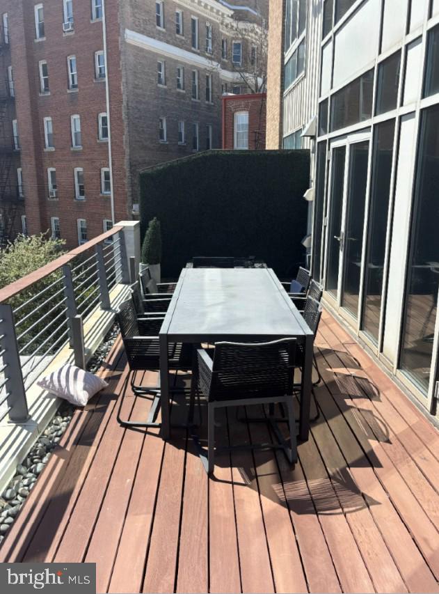 2424 18th Street Northwest, Unit R4 Washington, DC 20009 - Photo 21 of 40 a view of a patio with a table and chairs