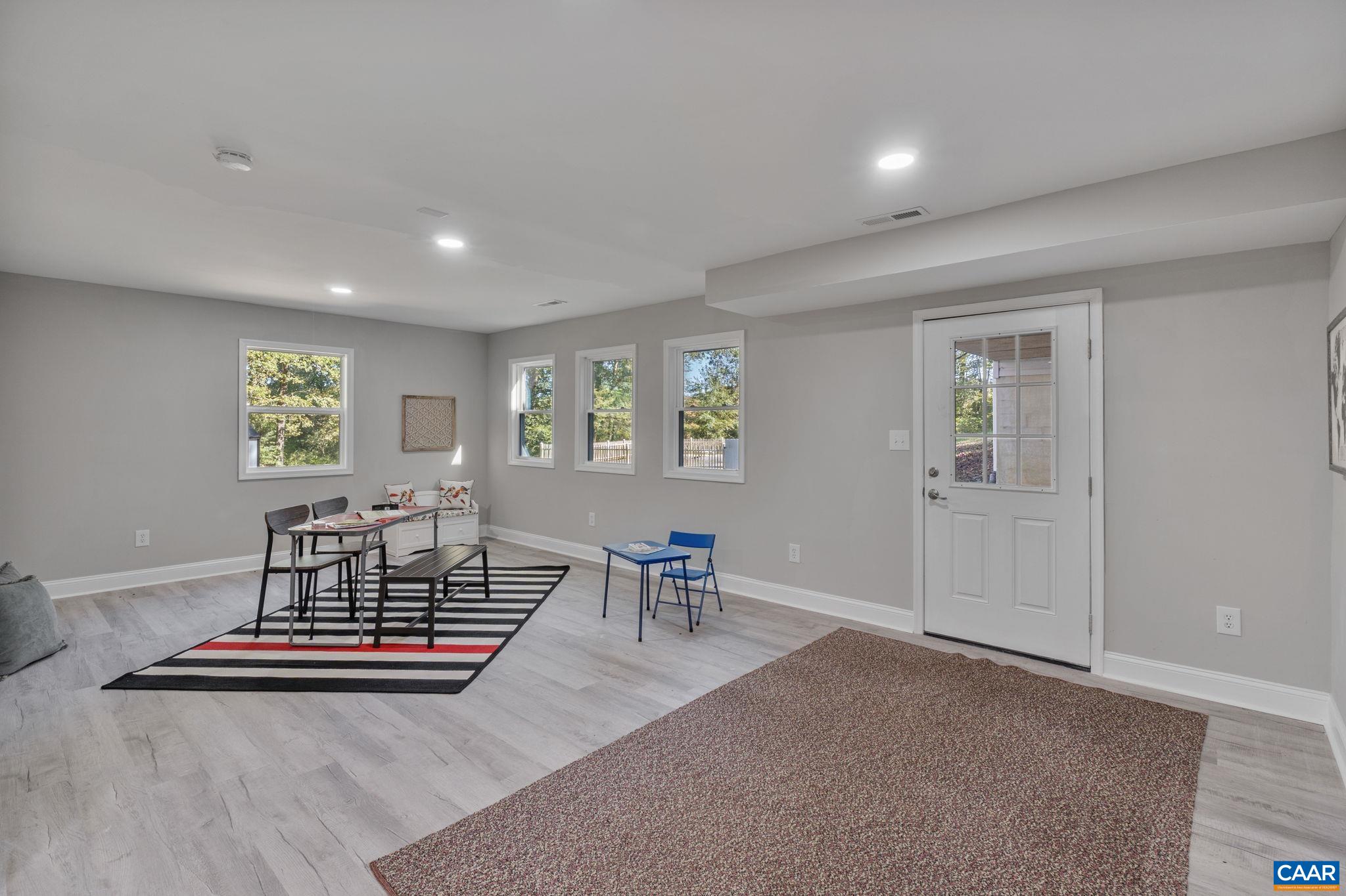 612 Oneals Road Pratts, VA 22731 - Photo 28 of 68 a living room with furniture and a window