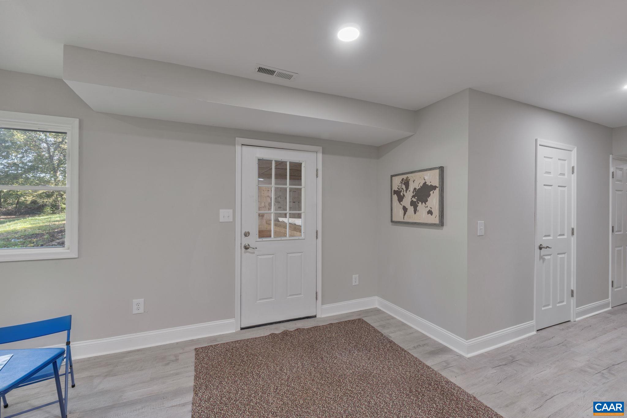 612 Oneals Road Pratts, VA 22731 - Photo 29 of 68 an empty room with windows