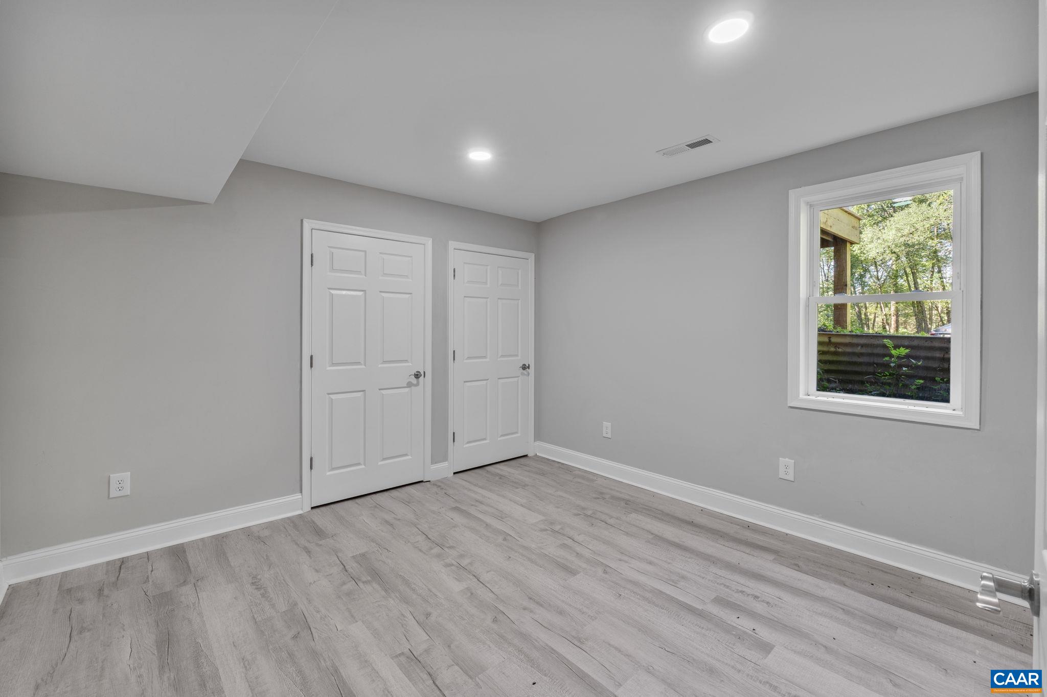 612 Oneals Road Pratts, VA 22731 - Photo 35 of 68 a view of empty room with wooden floor and fan