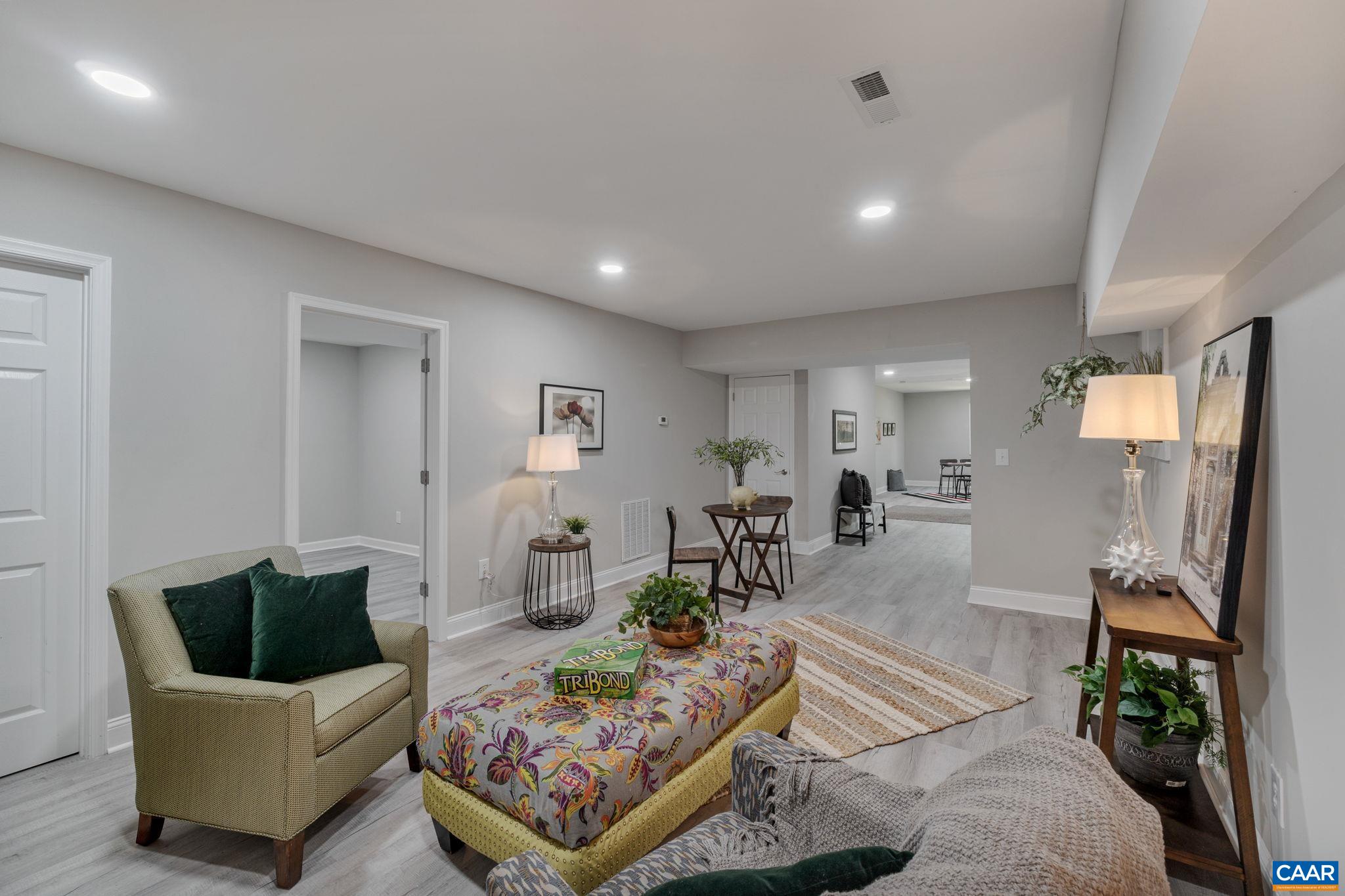 612 Oneals Road Pratts, VA 22731 - Photo 37 of 68 a living room with furniture and wooden floor