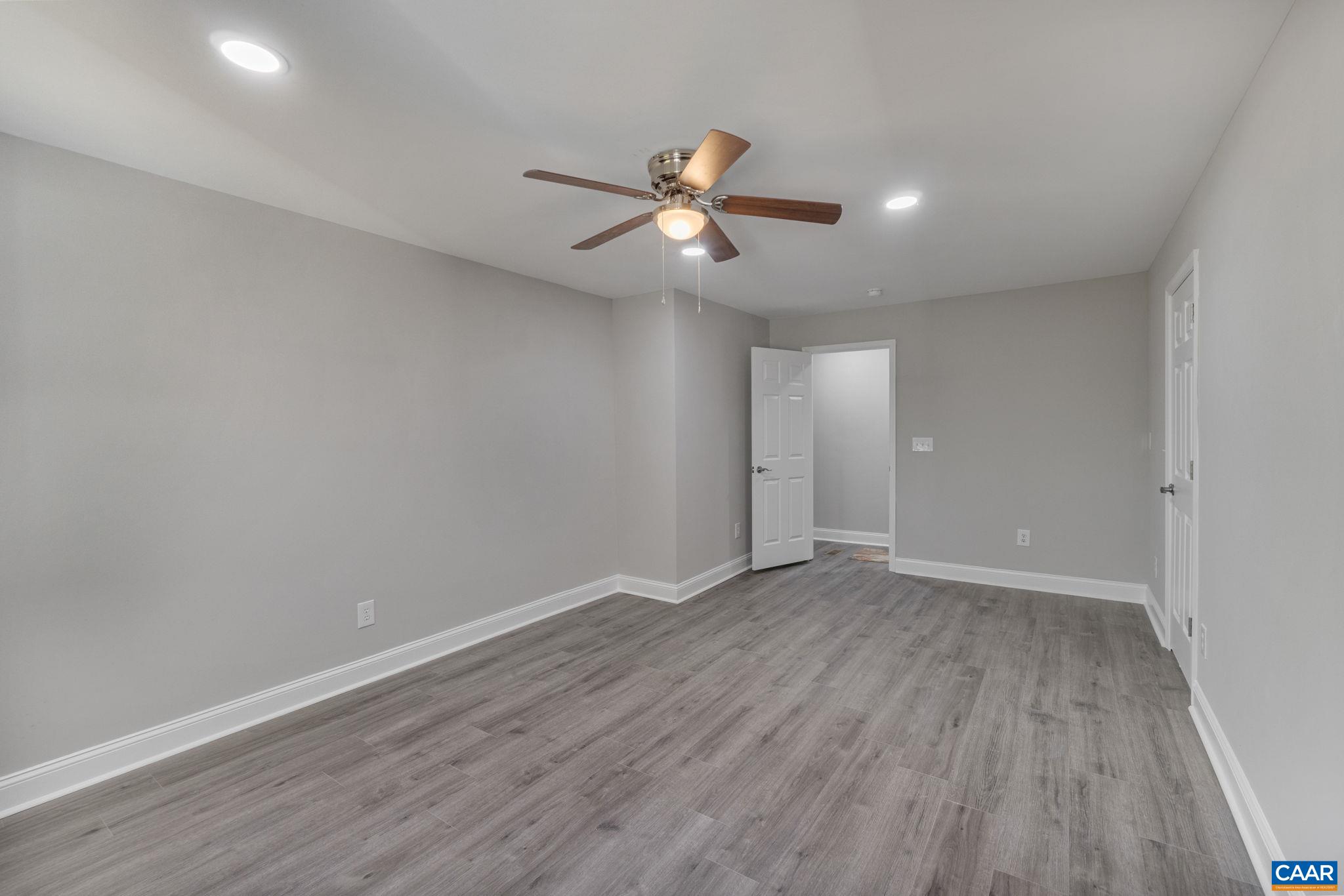 612 Oneals Road Pratts, VA 22731 - Photo 43 of 68 a view of an empty room with wooden floor