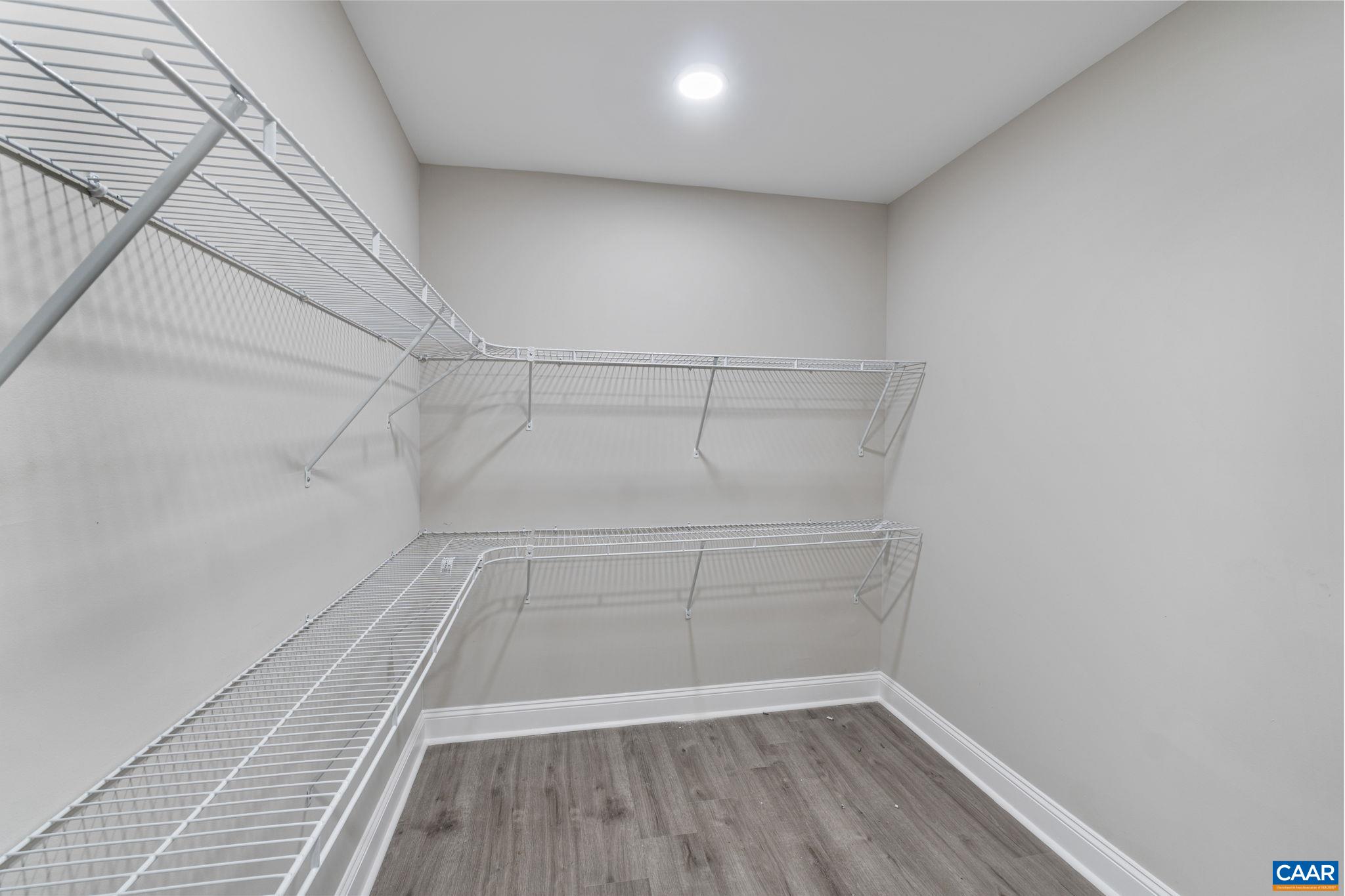 612 Oneals Road Pratts, VA 22731 - Photo 44 of 68 a view of a room with racks on the wall