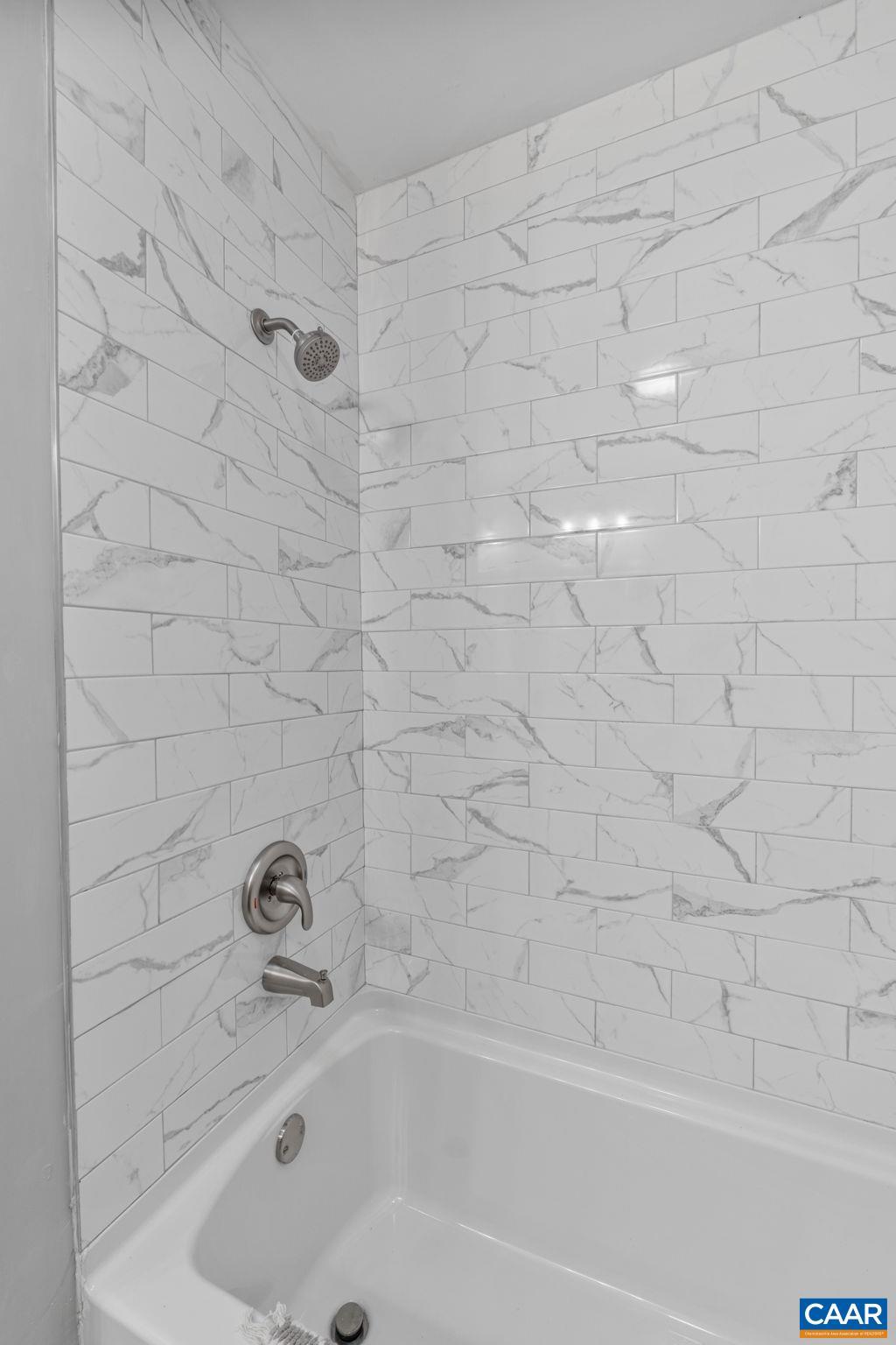 612 Oneals Road Pratts, VA 22731 - Photo 50 of 68 a bathroom with a bathtub