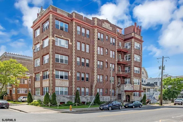 a view of a building and a street