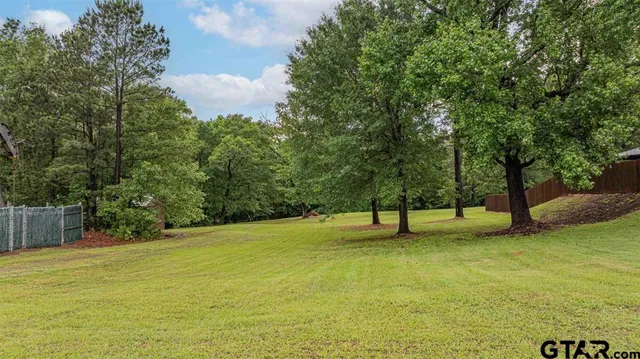 a view of an outdoor space with swimming pool