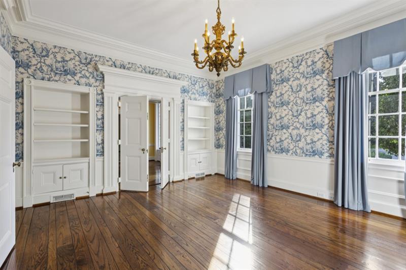 3700 Randall Mill Road Northwest Atlanta, GA 30327 - Photo 13 of 59 wooden floor in an empty room with a window