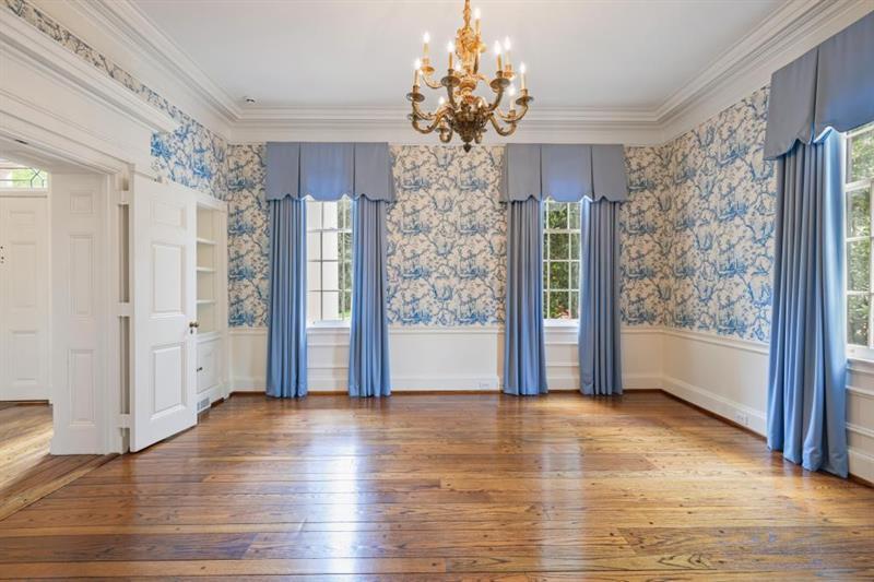 3700 Randall Mill Road Northwest Atlanta, GA 30327 - Photo 15 of 59 a view of livingroom with front door and wooden floor