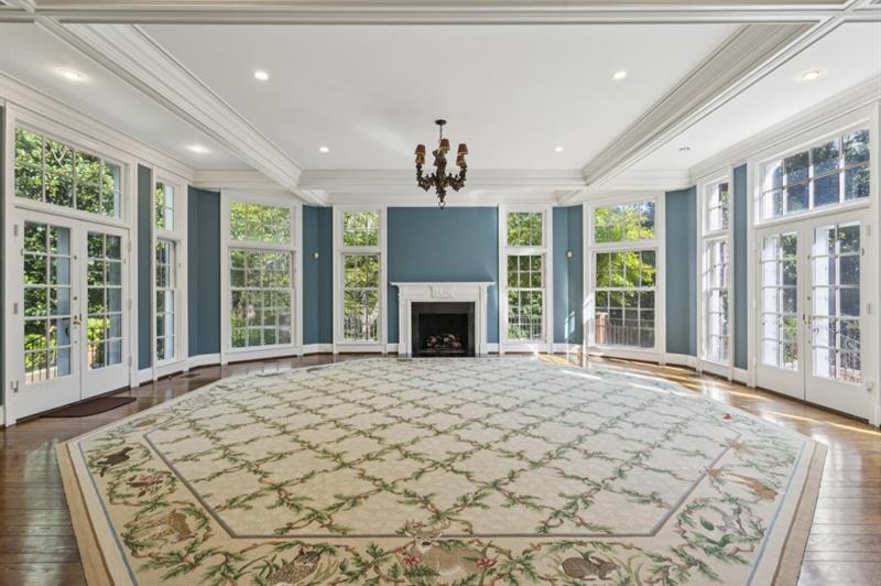 3700 Randall Mill Road Northwest Atlanta, GA 30327 - Photo 22 of 59 a view of an empty room with a fireplace and a window