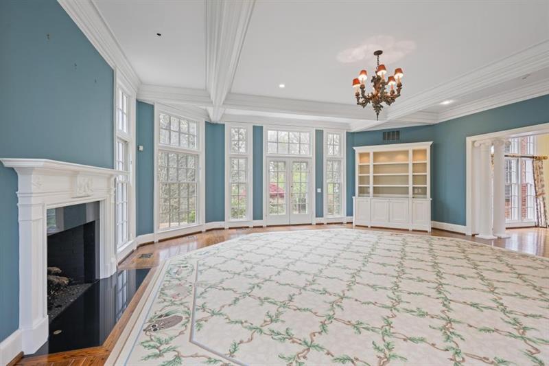 3700 Randall Mill Road Northwest Atlanta, GA 30327 - Photo 24 of 59 a view of an empty room with a fireplace and a window
