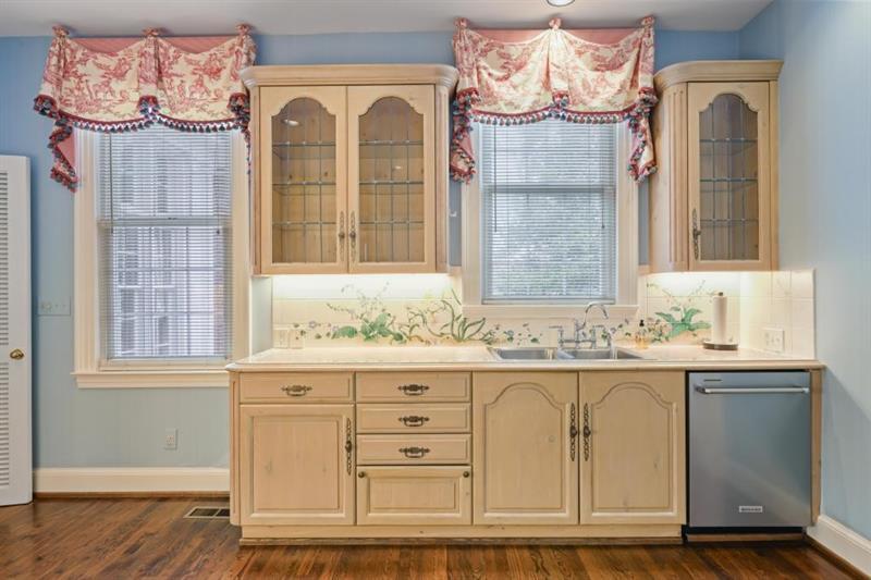 3700 Randall Mill Road Northwest Atlanta, GA 30327 - Photo 27 of 59 a view of granite countertop white cabinets and a wooden floor