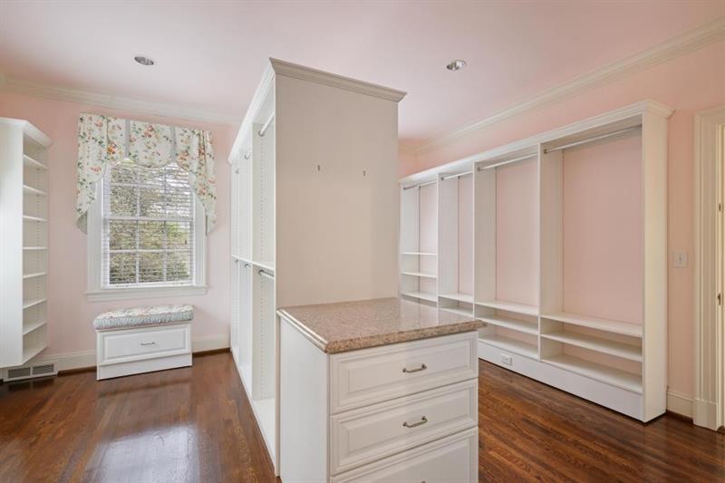 3700 Randall Mill Road Northwest Atlanta, GA 30327 - Photo 38 of 59 a view of walk in closet with wooden floor