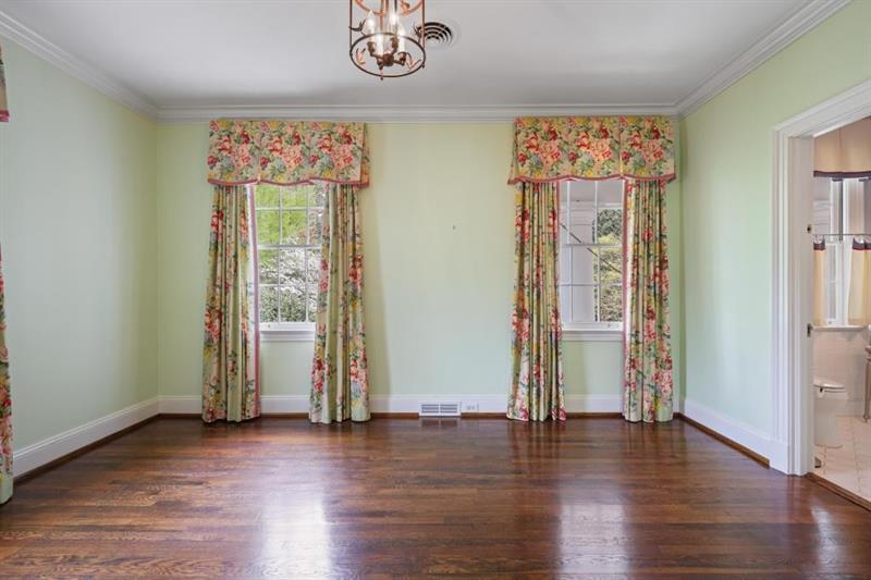 3700 Randall Mill Road Northwest Atlanta, GA 30327 - Photo 44 of 59 an empty room with wooden floor and windows