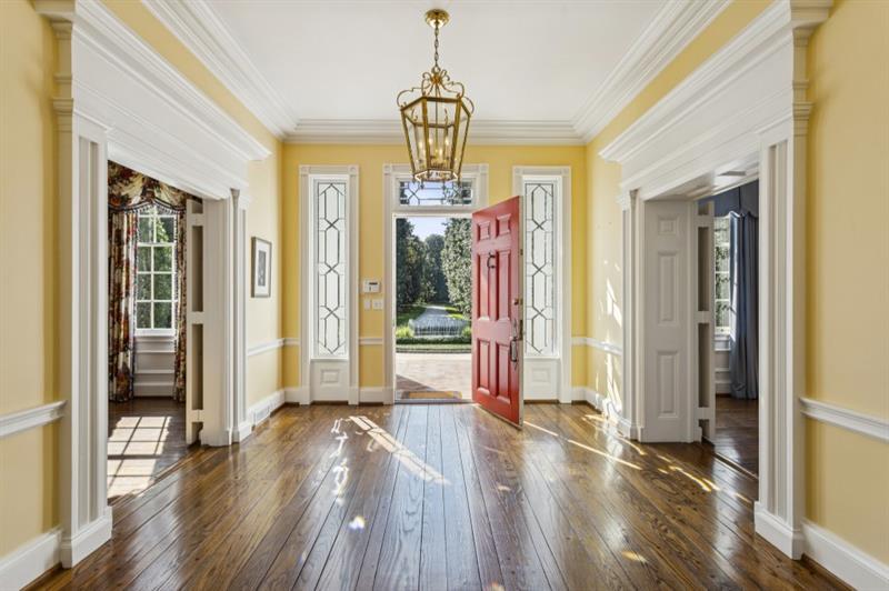 3700 Randall Mill Road Northwest Atlanta, GA 30327 - Photo 7 of 59 a view of a hallway with wooden floor and front door