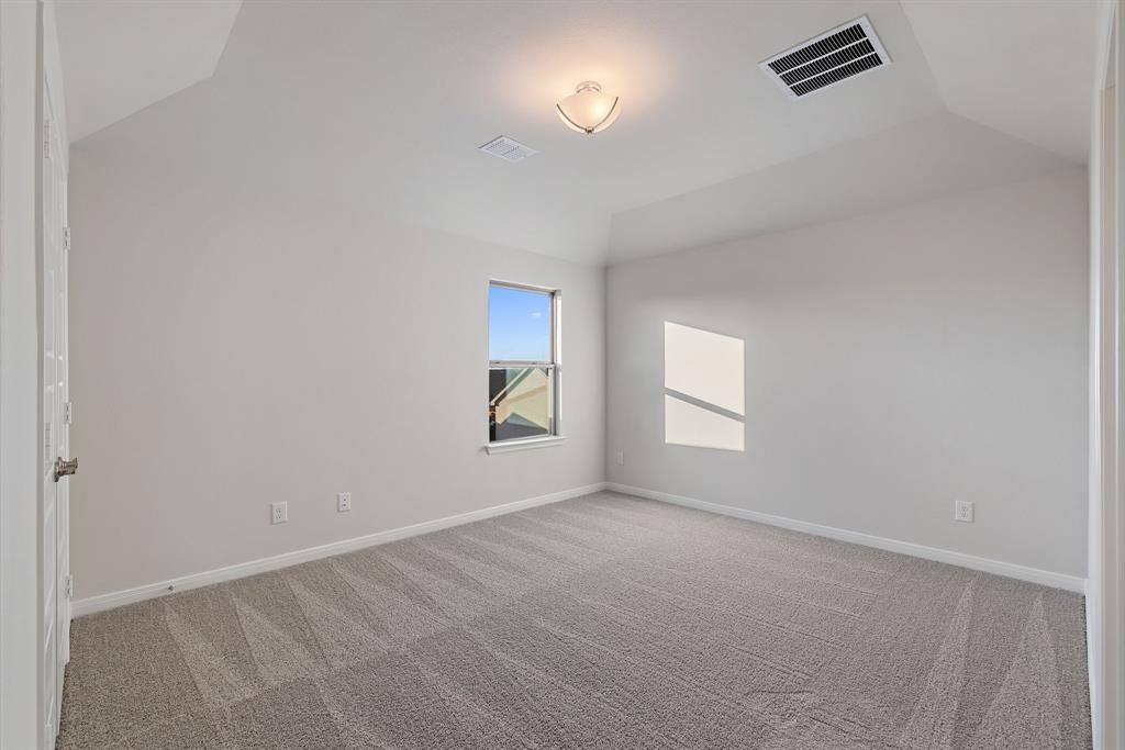 1840 Rosedale Avenue Van Alstyne, TX 75495 - Photo 26 of 26 an empty room with windows and mirror