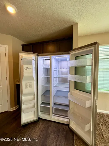 a view of a swimming pool and trees