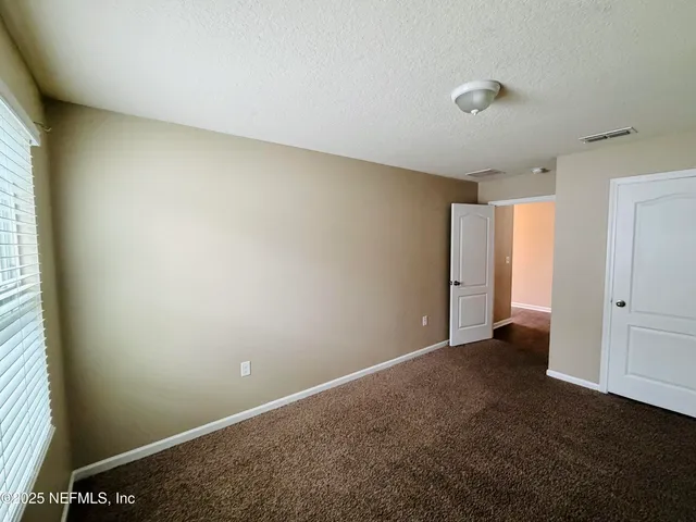 a kitchen with stainless steel appliances granite countertop a refrigerator stove microwave and sink