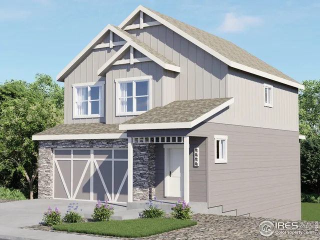 a front view of a house with garage